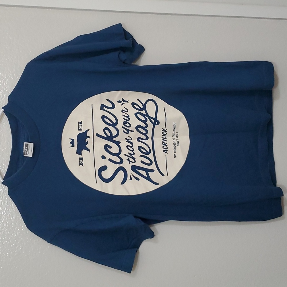 Acrylick brand size medium men's blue short sleeve t shirt w/ front graphic